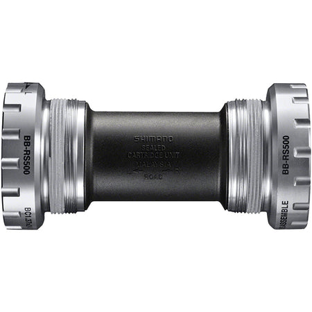 Shimano BB-RS501 bottom bracket installed in a bicycle frame, showing the cylindrical metal components for smooth pedal rotation.
