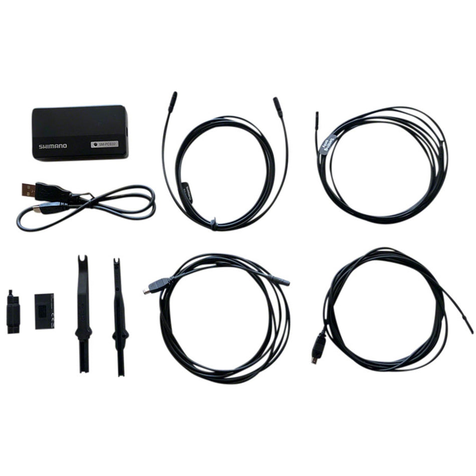 Shimano Di2 PC Linkage Device with System Checker for eBike diagnostics and connection, shown in image.