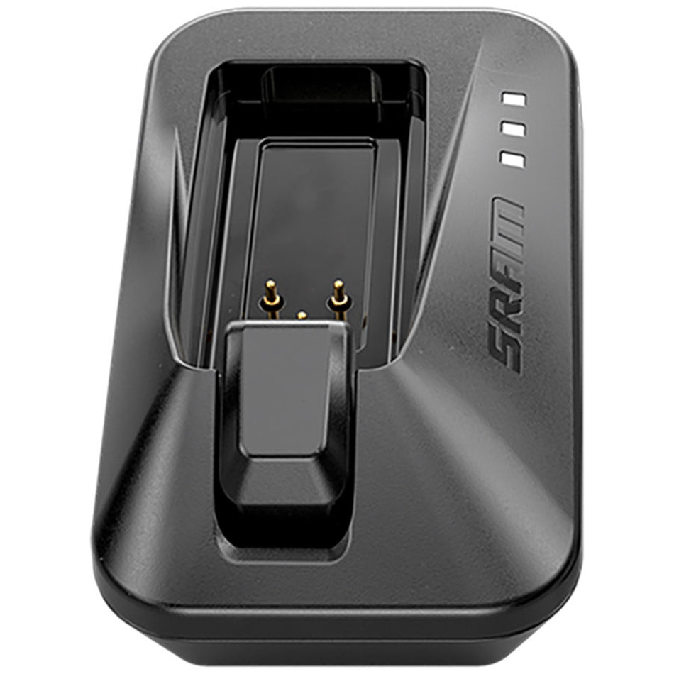 SRAM AXS battery and charger accessories for electronic shifters and bike components, shown in a close-up image.