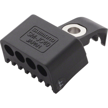 Shimano Di2 frame junction box for electronic shifters, shown in black with cable connections on a bicycle frame.