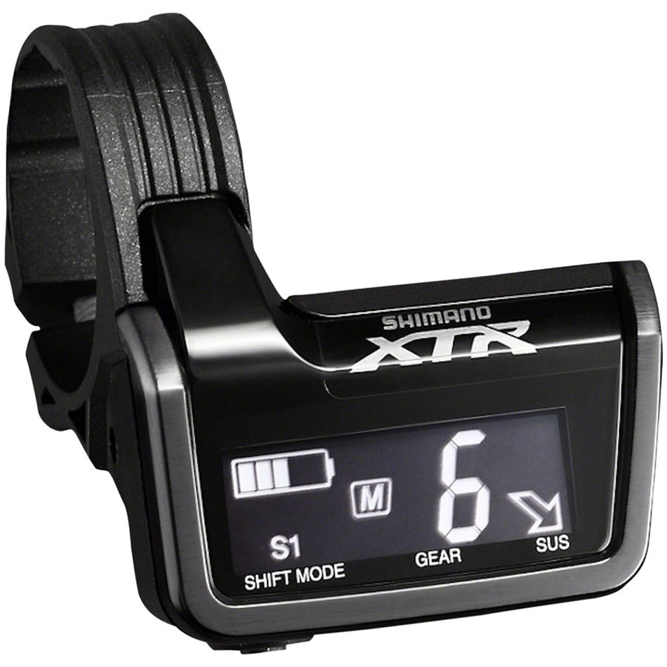 Shimano digital display unit for electronic shifters, showing gear settings and system information on a sleek electronic component.
