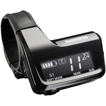 Shimano digital display unit for electronic shifters, showing a sleek electronic component with buttons and digital screen.