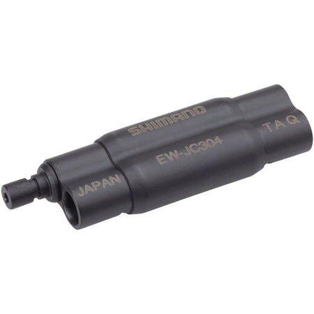 Shimano Di2 Frame Junction Box for electronic shifters, mounted on bike frame with visible wiring connections.