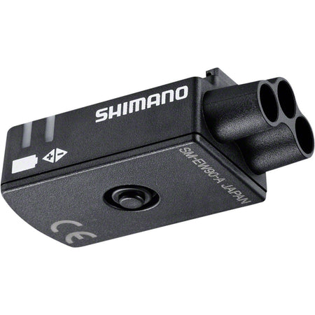 Shimano Di2 Junction Box for electronic shifters, compact black component with connection ports for bike electronic wiring.