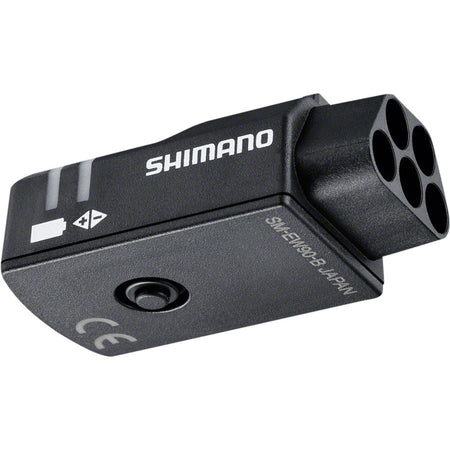 Shimano Di2 Junction Box for electronic shifters, compact device with wiring ports for e-bike gear system connection.