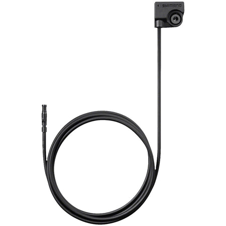 Shimano SS302 speed sensor connected to bicycle electrical cables and adapters, mounted on a bike wheel for accurate speed tracking.