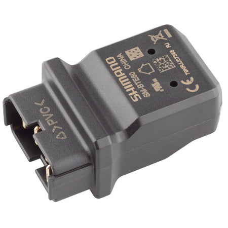 Shimano Steps Charger Parts with charger and cable for e-bike battery charging, compatible with Shimano e-bike systems.