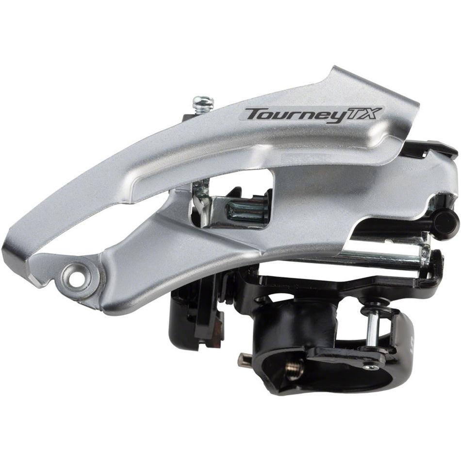 Shimano Tourney FD-TX51/TX50 front derailleur with model FD0594, mounted on bike chainstay, showcasing its black metal construction.