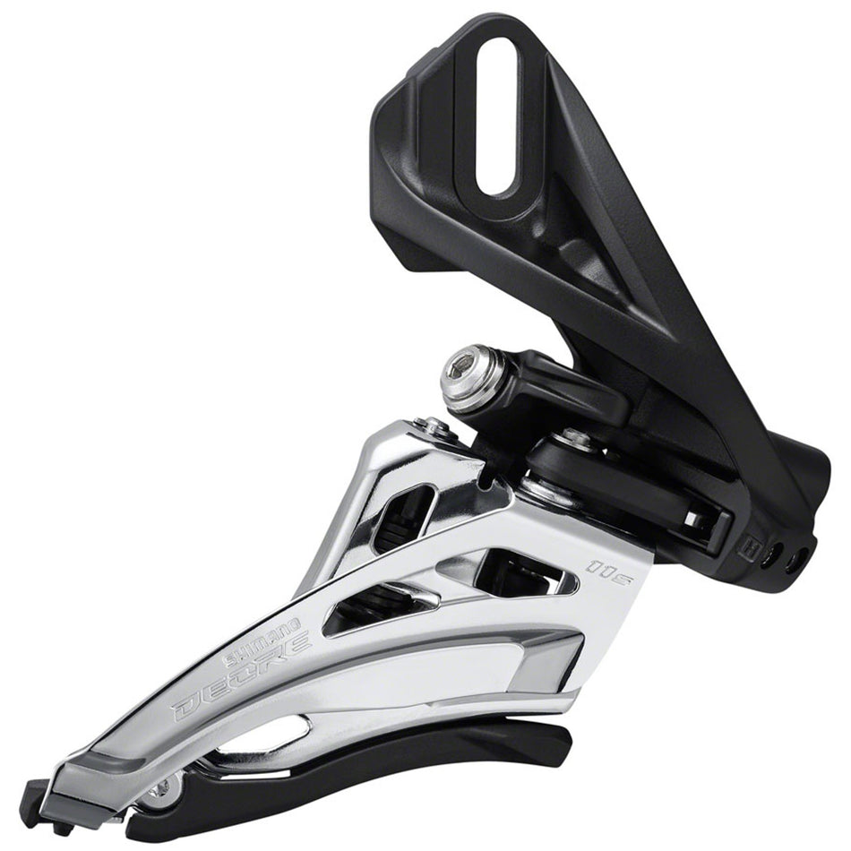 Shimano Deore M5100 front derailleur mounted on a bicycle, showing its black metal construction and mounting clamp for precise shifting.