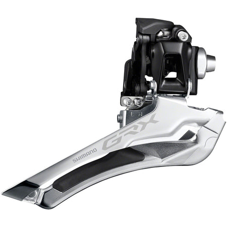 Shimano GRX FD-RX400 front derailleur mounted on bike, showcasing durable gravel cycling component with precise shifting capabilities.