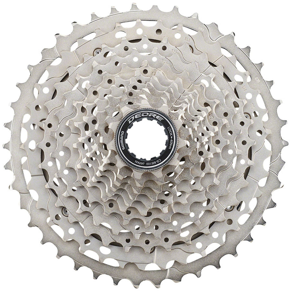 Shimano Deore M5100 bike cassette with multiple sprockets for smooth gear shifting on mountain or road bikes.