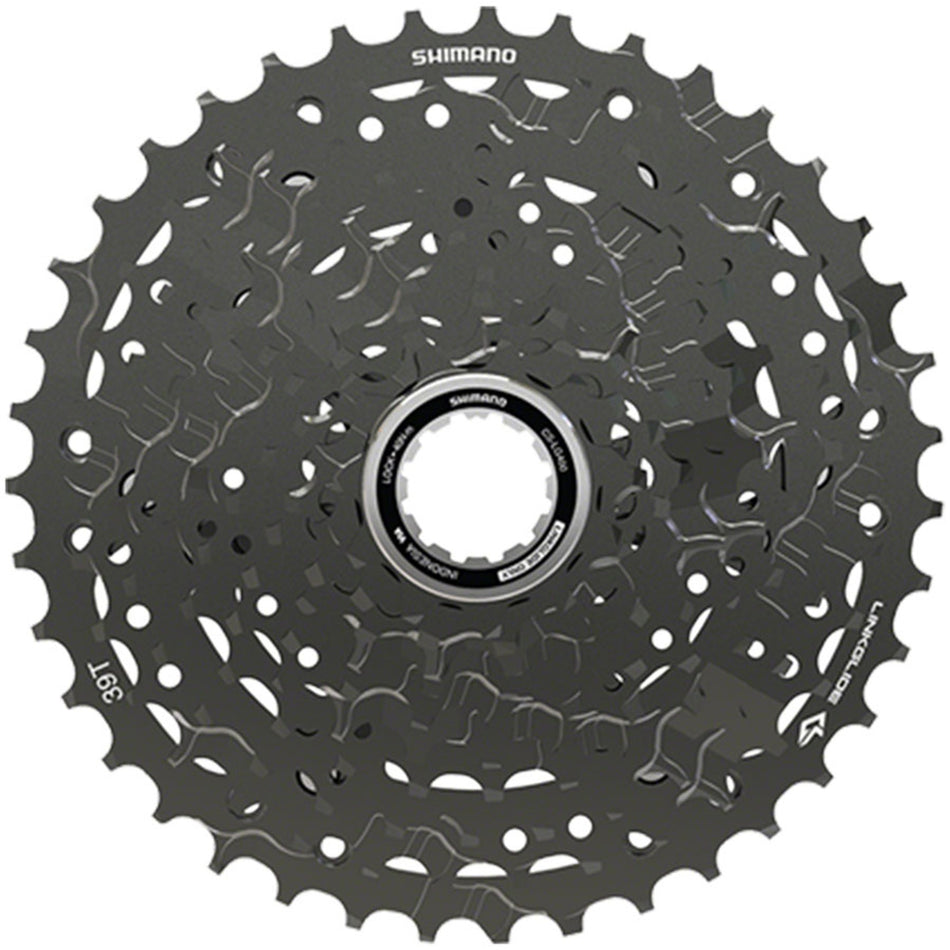 Shimano CUES CS-LG400 Linkglide cassette with multiple cogs for mountain bike gearing, black metal finish, close-up view
