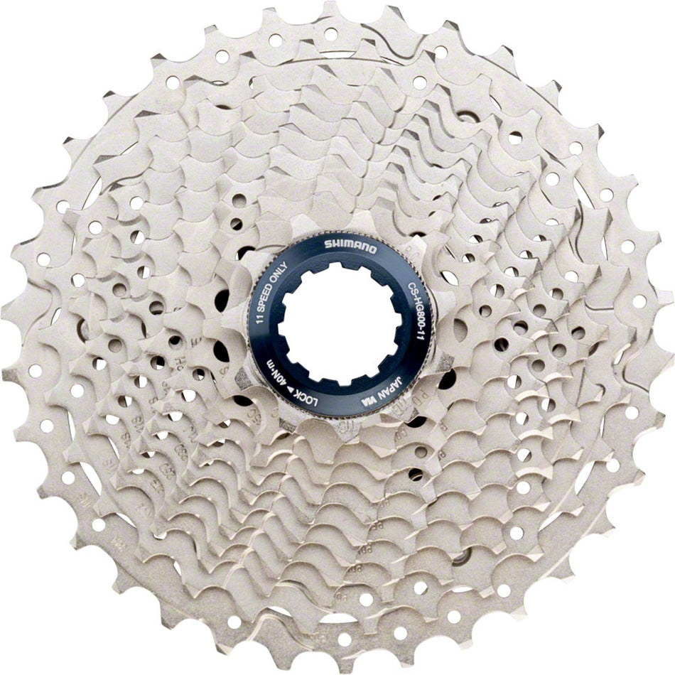 Shimano Ultegra CS-HG800 11-speed cassette with silver cogs for road bike gearing, showing the detailed gear teeth and branding.