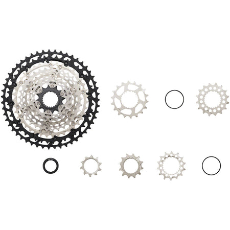 Shimano Deore XT CS-M8100 12-speed cassette with metal sprockets for mountain bike gearing, shown in close-up.