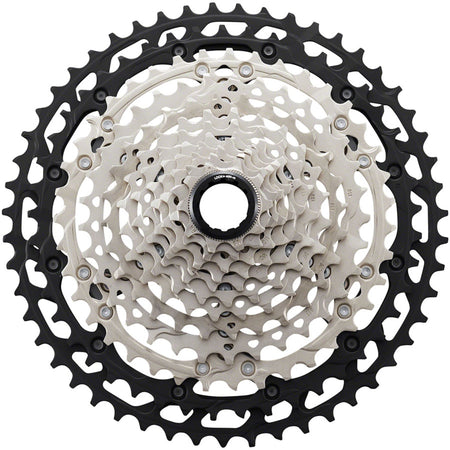 Shimano Deore XT CS-M8100 12-speed cassette with silver cogs and black body, designed for mountain bike gearing.