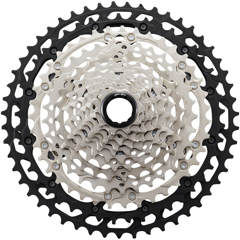 Shimano Deore XT CS-M8100 12-speed cassette with silver cogs and black body, designed for mountain bike gearing.