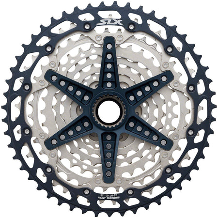 Shimano SLX CS-M7100 12-speed cassette with metal sprockets and black body, designed for mountain bikes.