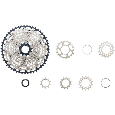 Shimano SLX CS-M7100 12-speed cassette with silver cogs and black body, designed for mountain bike gearing systems.