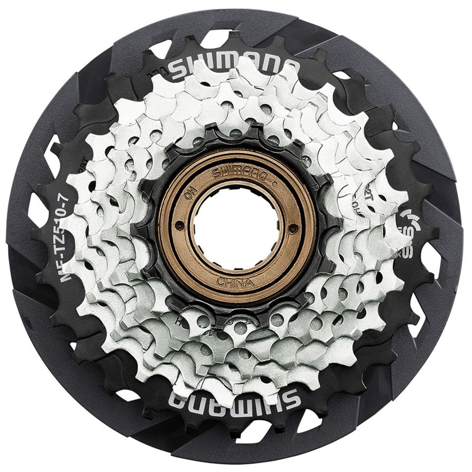 Shimano multi-speed freewheel for bicycles, showing the FW1211 model with multiple cogs and gear teeth for smooth shifting.