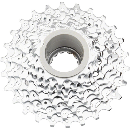 SRAM PG-1050 10-speed silver cassette with multiple cogs on a bike drivetrain, showcasing durable metallic gear components.
