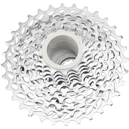 SRAM PG-1050 10-speed silver cassette with metal cogs for bike drivetrain, shown on a white background.