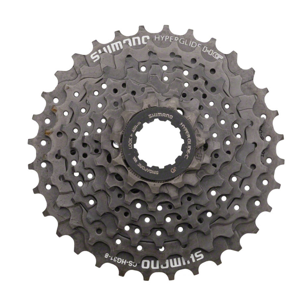 Shimano CS-HG31 8-speed cassette with metal sprockets and black body, designed for mountain and road bike gearing.