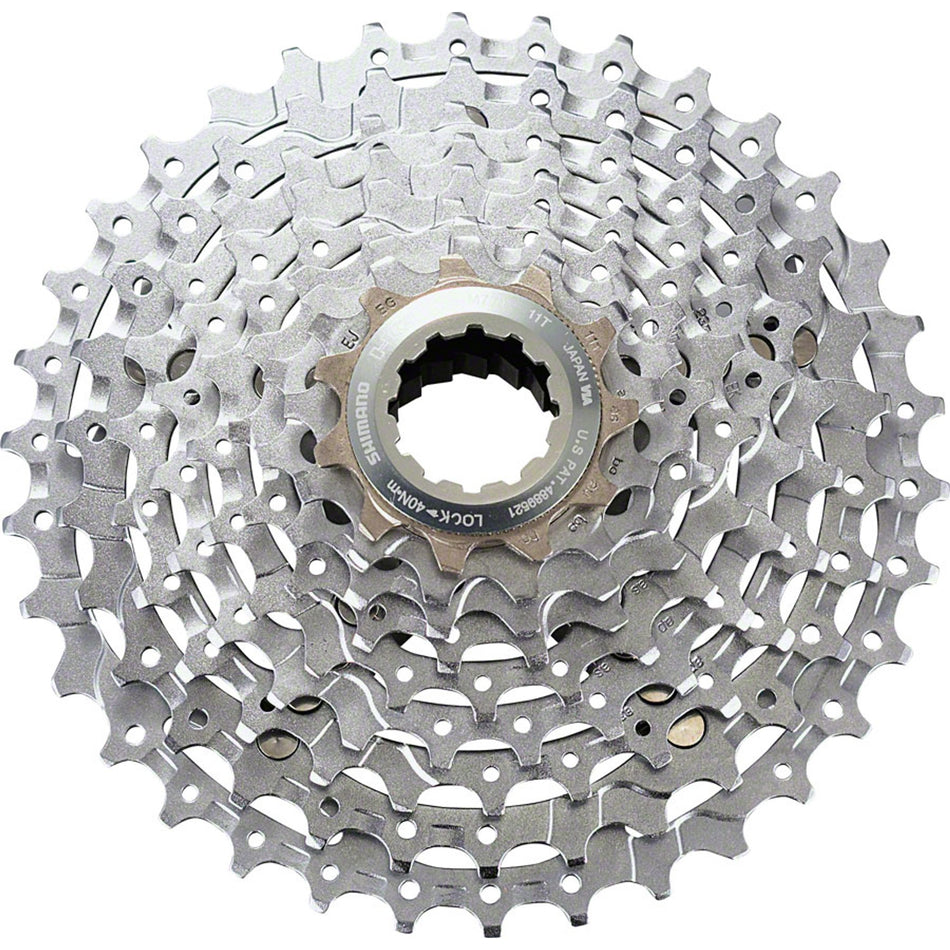Shimano Deore XT CS-M770 9-speed cassette with metal cogs and black finish, designed for mountain bike drivetrain.