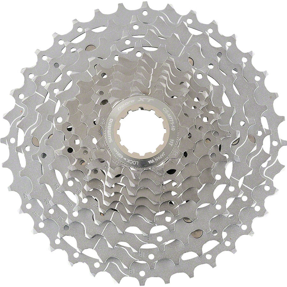 Shimano Deore XT CS-M771 10-speed cassette with silver sprockets and black body, designed for mountain bike gearing.