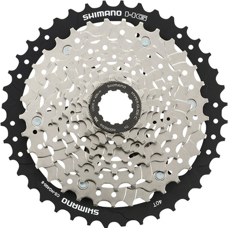 Shimano CS-HG400 cassette with multiple gears and silver cogs, designed for mountain and road bike drivetrain performance.