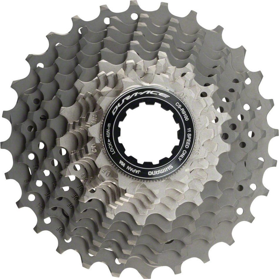 Shimano Dura-Ace CS-R9100 11-speed cassette with polished metal cogs for high-performance road cycling gear.