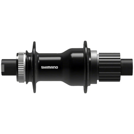 Shimano SLX FH-M7000 series rear hub with black alloy body and quick-release skewer, mounted on a bicycle wheel.
