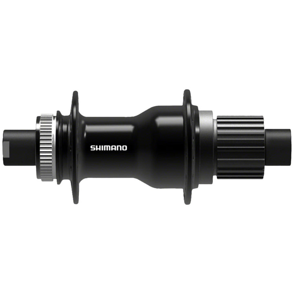 Shimano SLX FH-M7000 series rear hub with black alloy body and quick-release skewer, mounted on a bicycle wheel.
