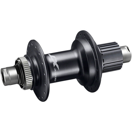 Shimano XT FH-M8110/M8130 rear hub with black anodized finish and quick-release axle for mountain bike wheel setup.