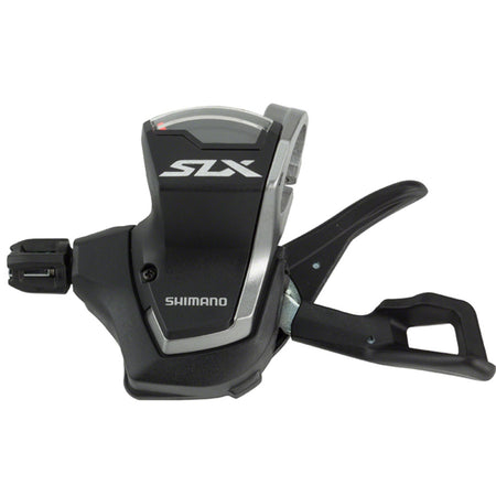 Shimano SLX M7000 mechanical shifter with gear indicator and grip, used for mountain bike gear shifting.