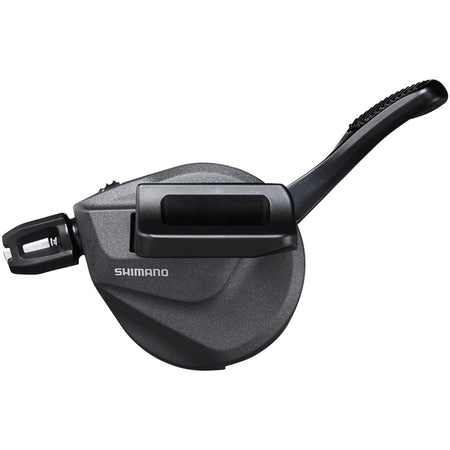 Shimano Deore XT SL-M8100 mechanical shifter with ergonomic grip and gear display, designed for mountain bike gear shifting.