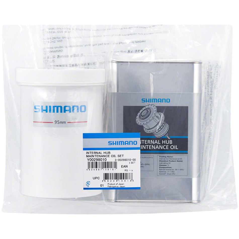 Shimano maintenance oil for lubricating bike chains and moving parts, shown in a clear container with a precise application nozzle.