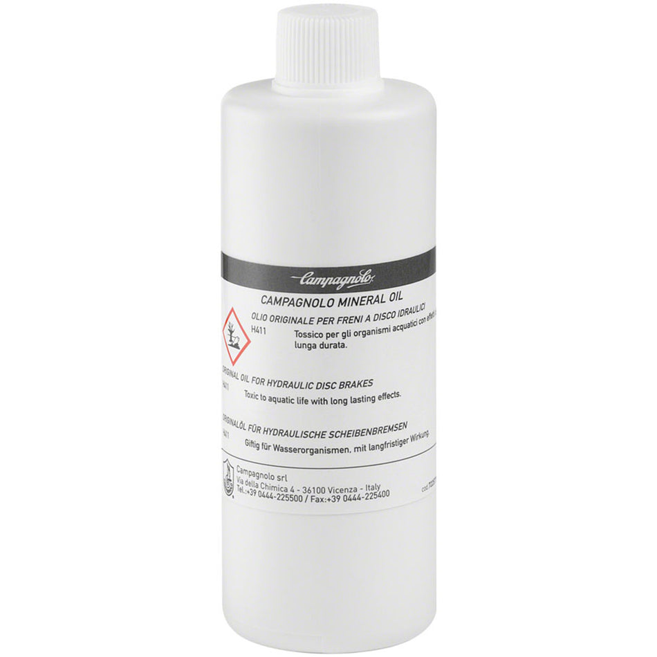Campagnolo hydraulic brake fluid bottle, a brake tool product for bicycle maintenance, with clear label and cap visible.