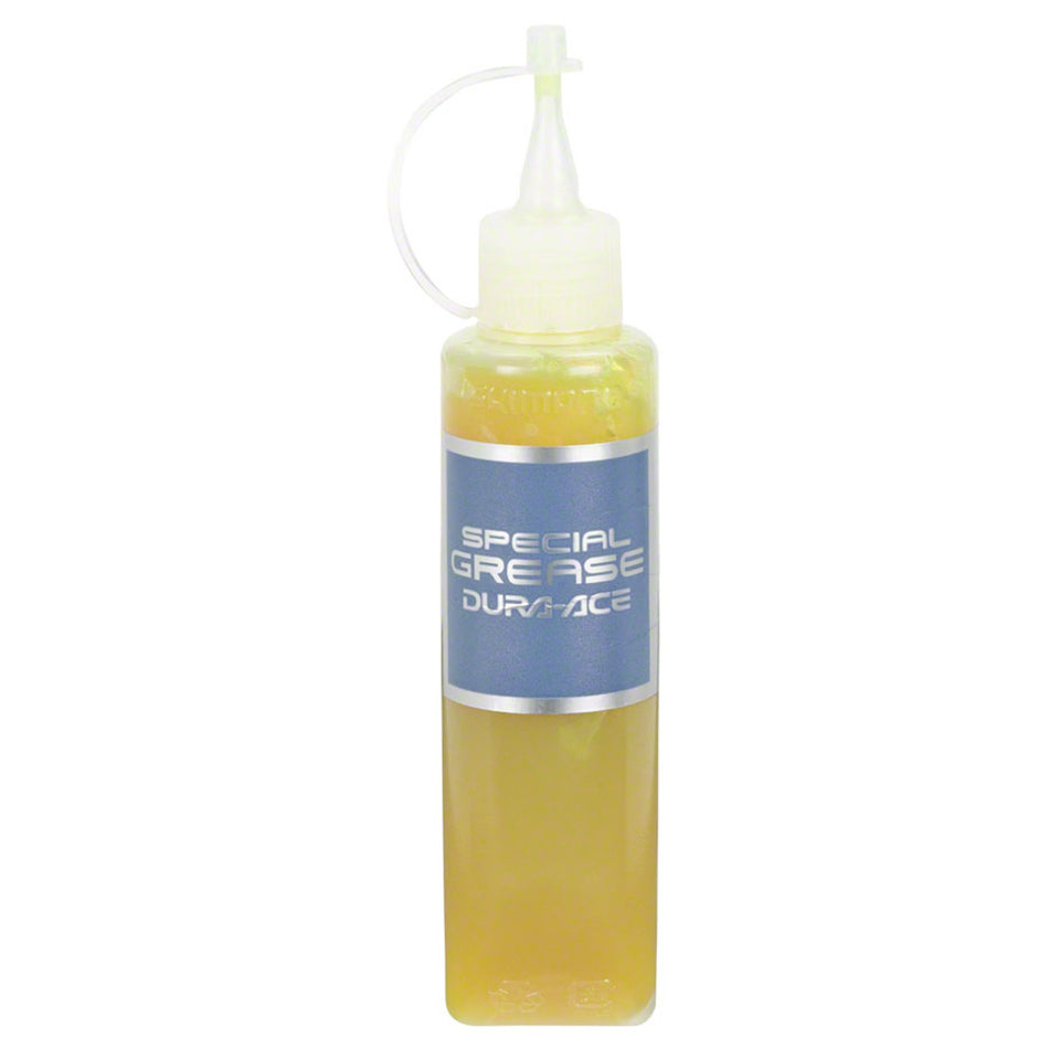 Shimano Dura-Ace grease for bike maintenance, showing a container of high-quality lubricant for bicycle components.