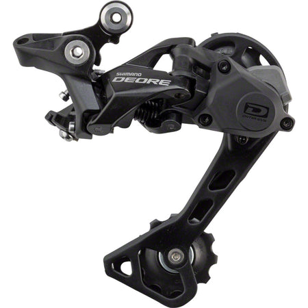 Shimano Deore RD-M6000 10-speed rear derailleur mounted on bike, showing sleek black body and metal mounting hardware.