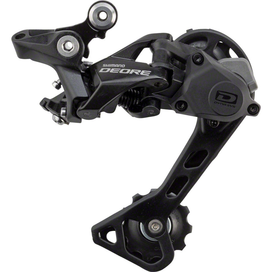 Shimano Deore RD-M6000 10-speed rear derailleur mounted on bike, showing sleek black body and metal mounting hardware.