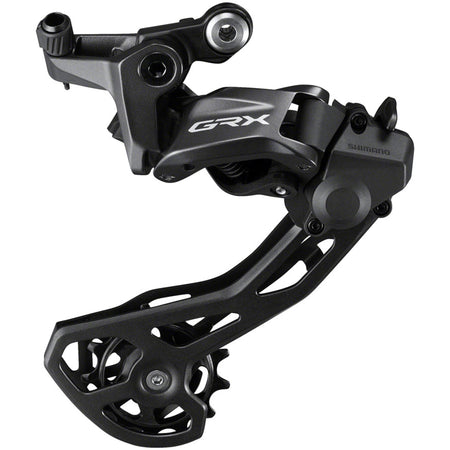 Shimano GRX RD-RX820 rear derailleur for gravel bikes, showing the sleek design and cable attachment in a close-up image.