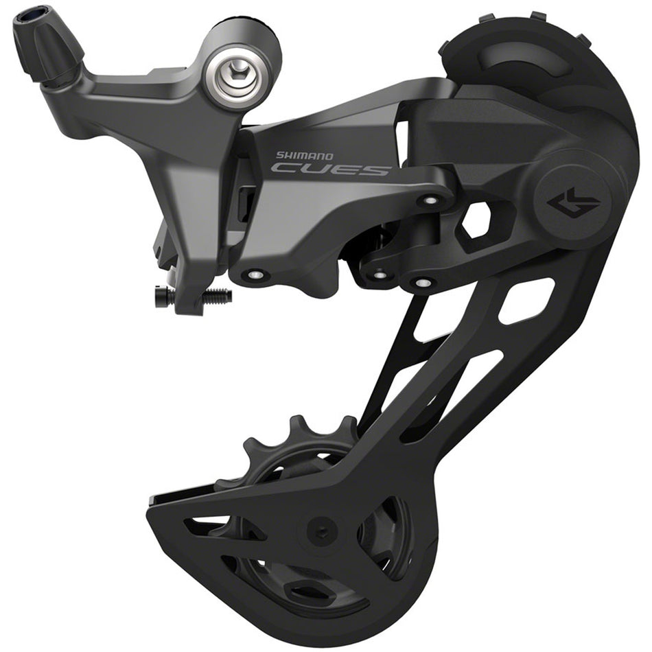 Shimano CUES RD-U6020 Linkglide rear derailleur mounted on a bicycle, showcasing the Shimano rear derailleur design and build.