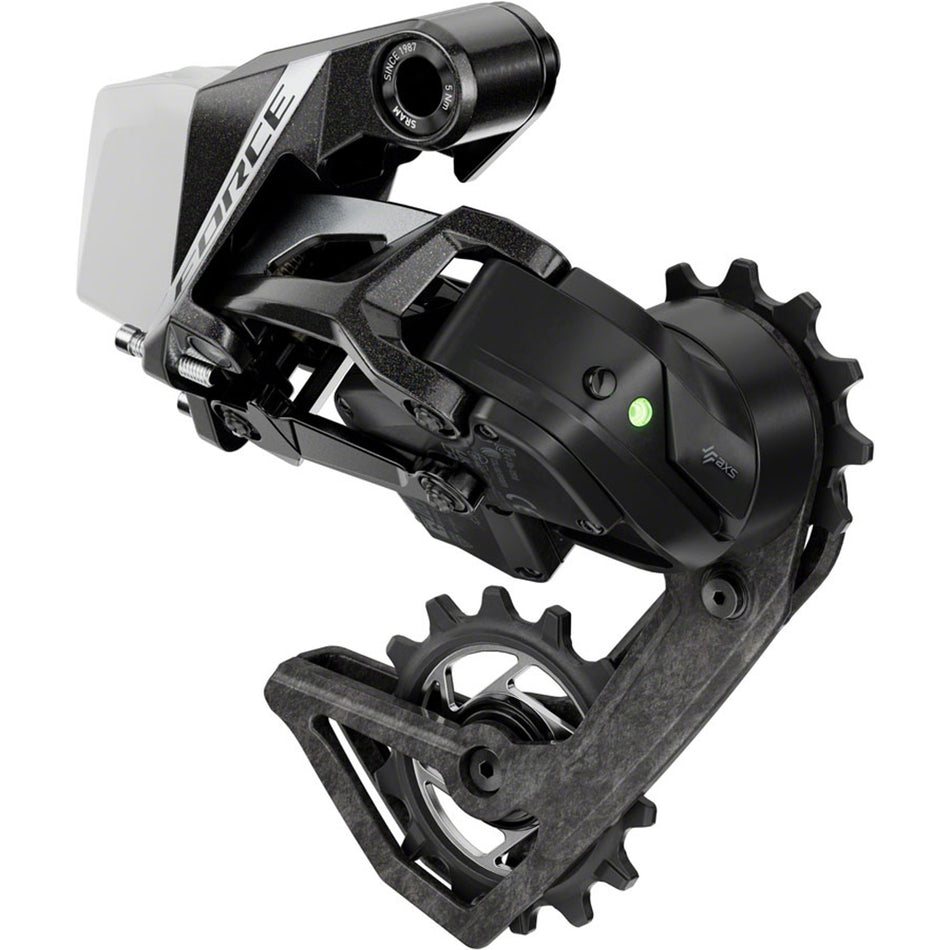 SRAM Force eTAP AXS rear derailleur mounted on a bike, showcasing lightweight design and precise gear shifting components.