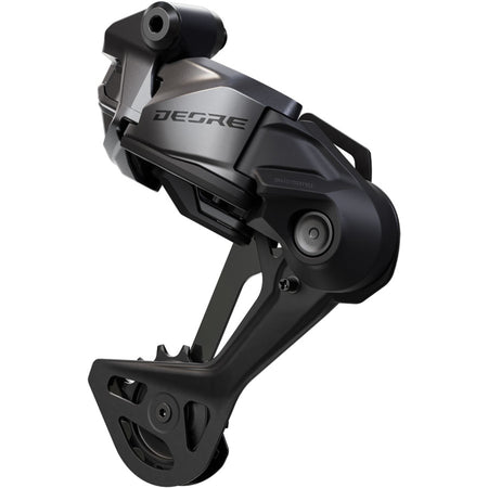 Shimano Deore RD-M6260-12 Di2 wired power 12-speed E-MTB rear derailleur mounted on bike, showing gear hanger and derailleur cage.