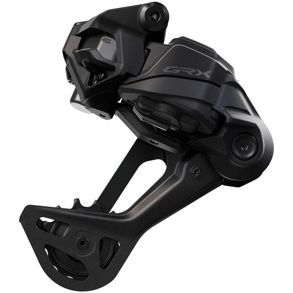 Shimano GRX RD-RX717-SGS Di2 wireless rear derailleur mounted on bike, showing sleek design and precise shifting components.