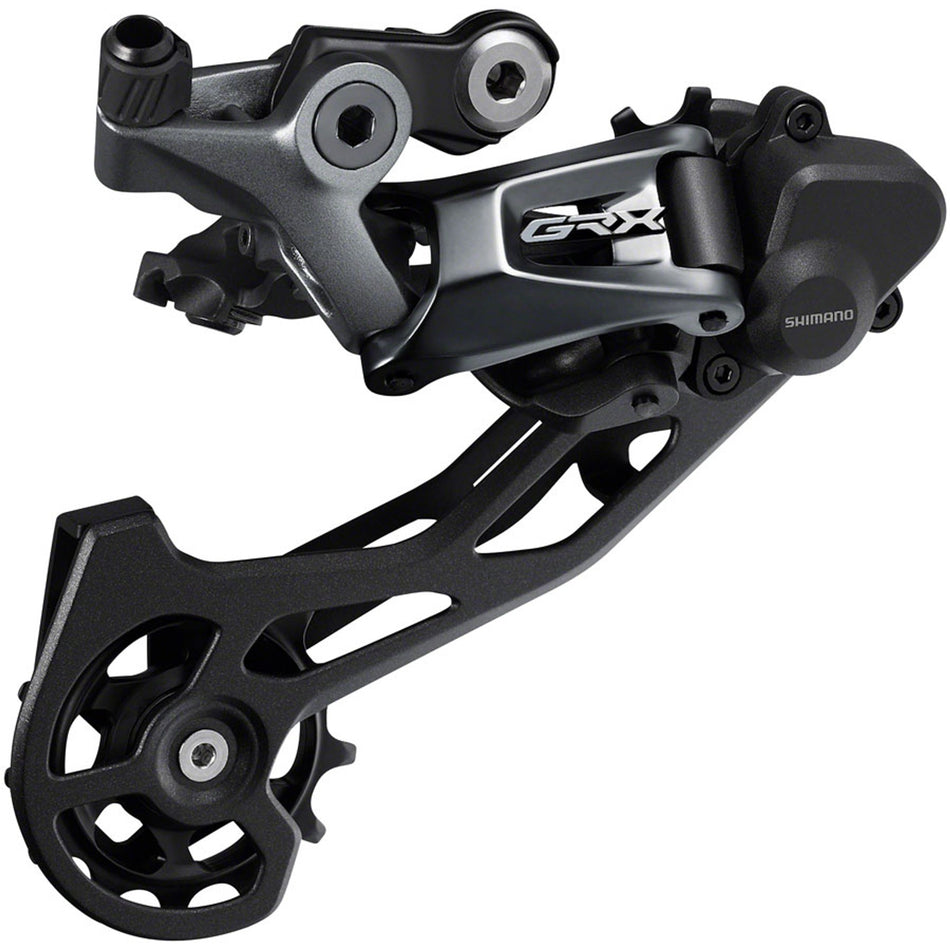 Shimano GRX RD-RX810 11-speed rear derailleur showing metallic body and jockey wheels for gravel bike shifting.