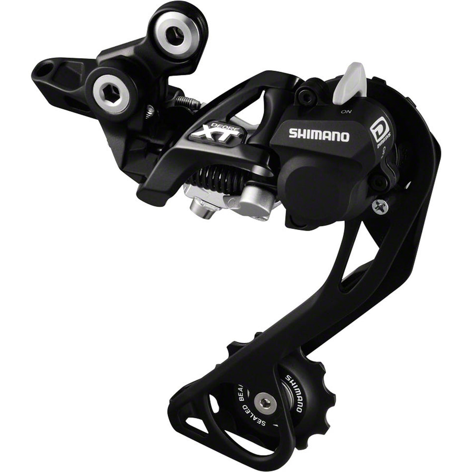 Shimano Deore XT RD-M780/M770 series rear derailleur for mountain bikes, showing the sleek black design and gear mounting mechanism.