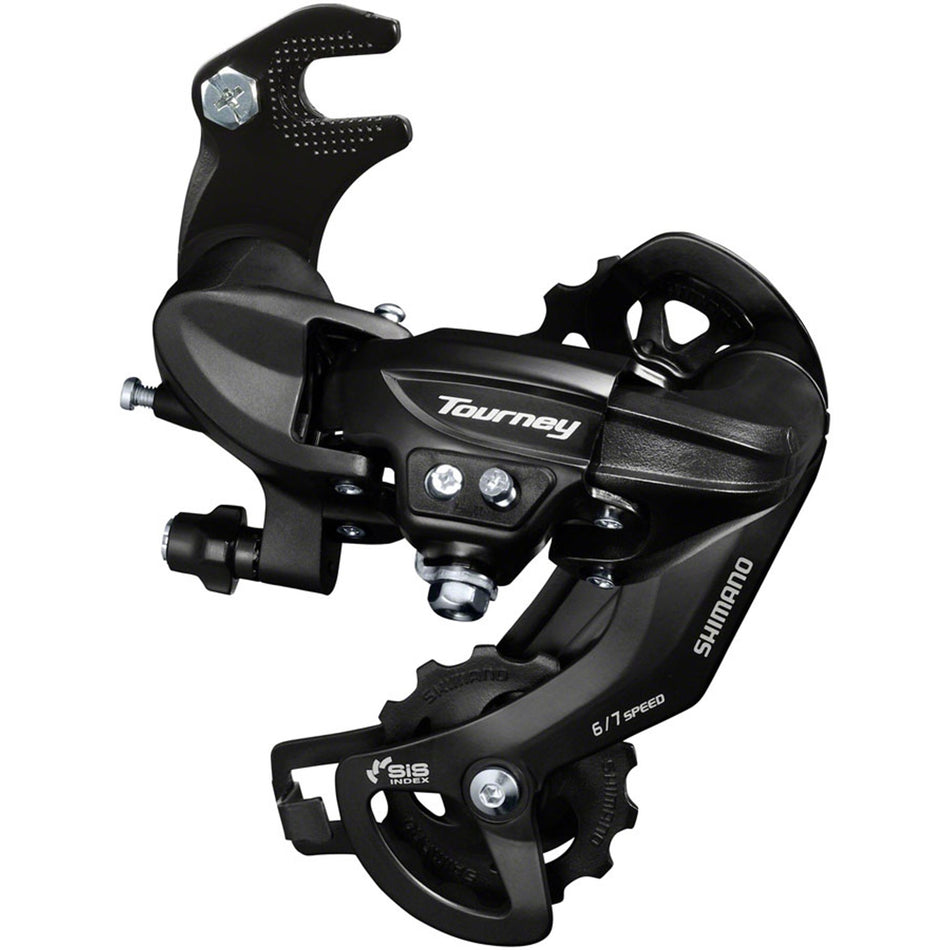 Shimano Tourney RD-TY300-SGS 6/7-speed rear derailleur mounted on bicycle, showcasing gear mechanism and construction details.