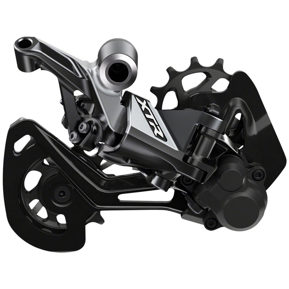 Shimano XTR RD-M9100 rear derailleur with metallic finish and mounting hardware for mountain bike drivetrain.