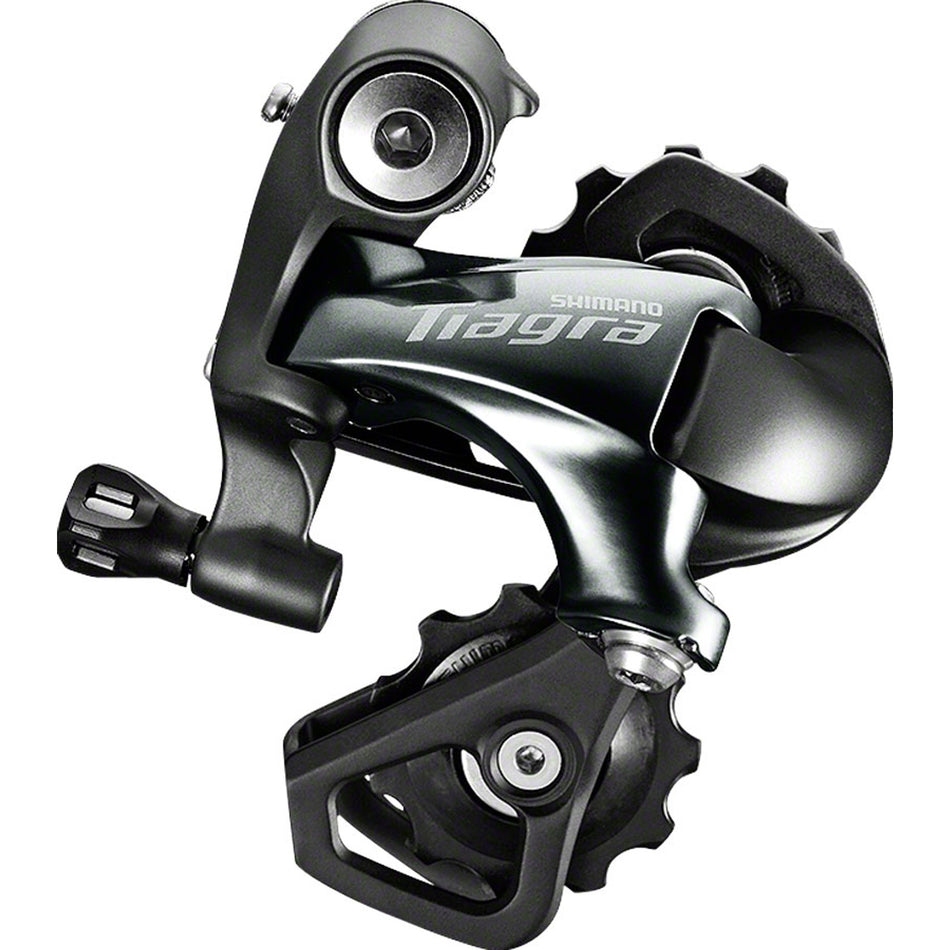 Shimano Tiagra RD-4700 rear derailleur showing the black alloy body and precise gear mechanism for road bike shifting.